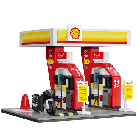 Gas Pumps with Motorbike filling up from the front view