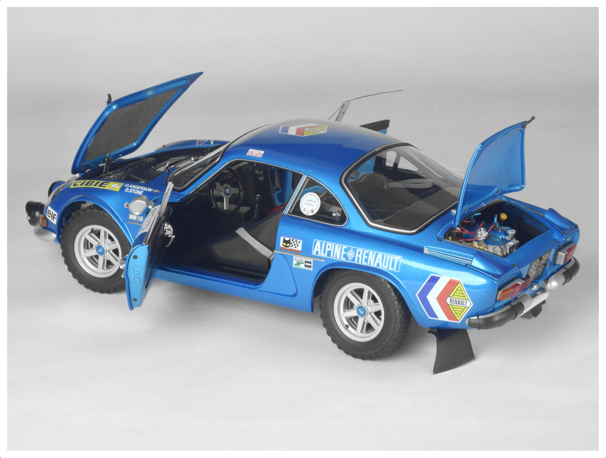 Rear angled shot showing bonnet, doors & boot lid open