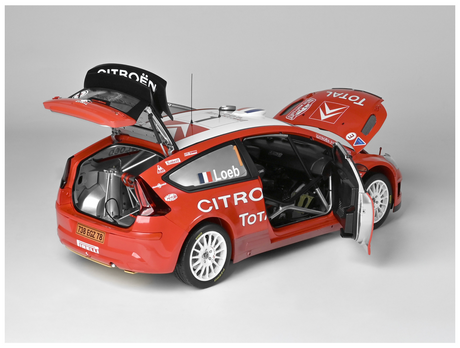 Rear angled shot showing boot lid, doors & bonnet open