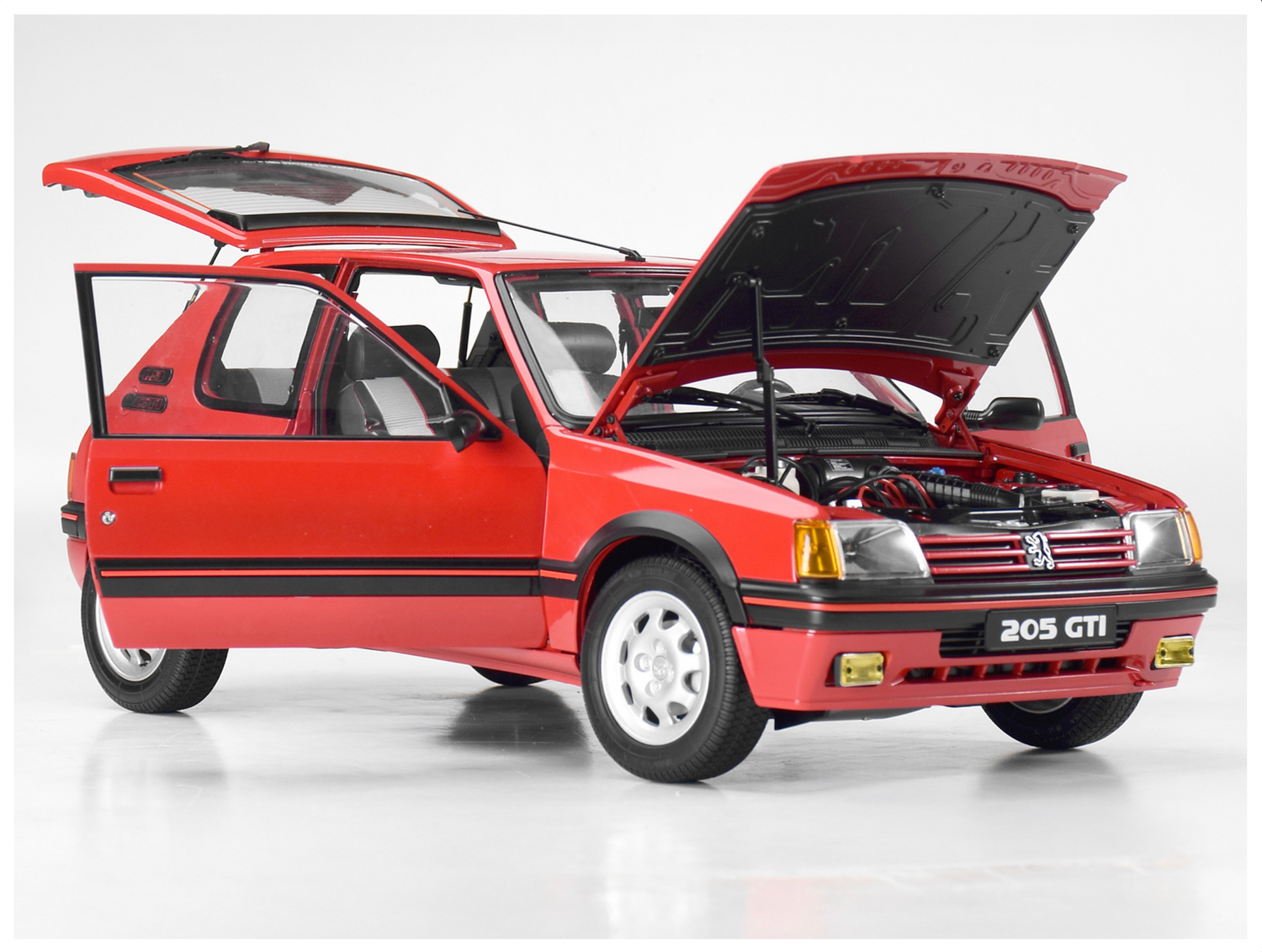 Front angled shot showing bonnet, doors & hatch lid open