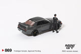 Mini GT Nissan Skyline GT-R (R32) NISMO Gunmetal w/ Matsuda Figure RHD 1:64 - MGT00869-R